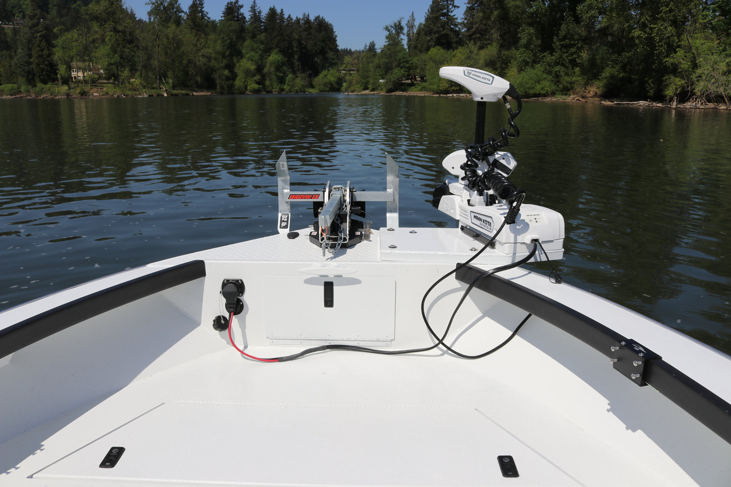 An Alumaweld Columbia 23' boat in motion on a body of water.