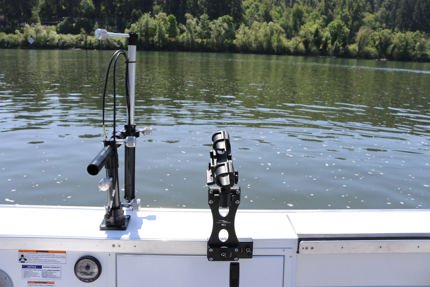 An Alumaweld Columbia 23' boat in motion on a body of water.