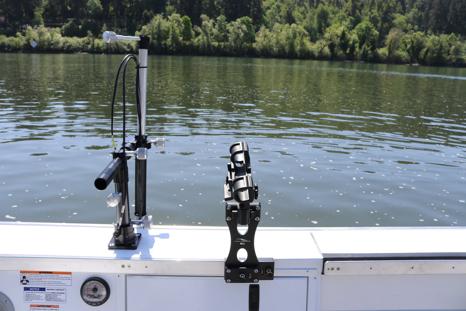 An Alumaweld Columbia 23' boat in motion on a body of water.