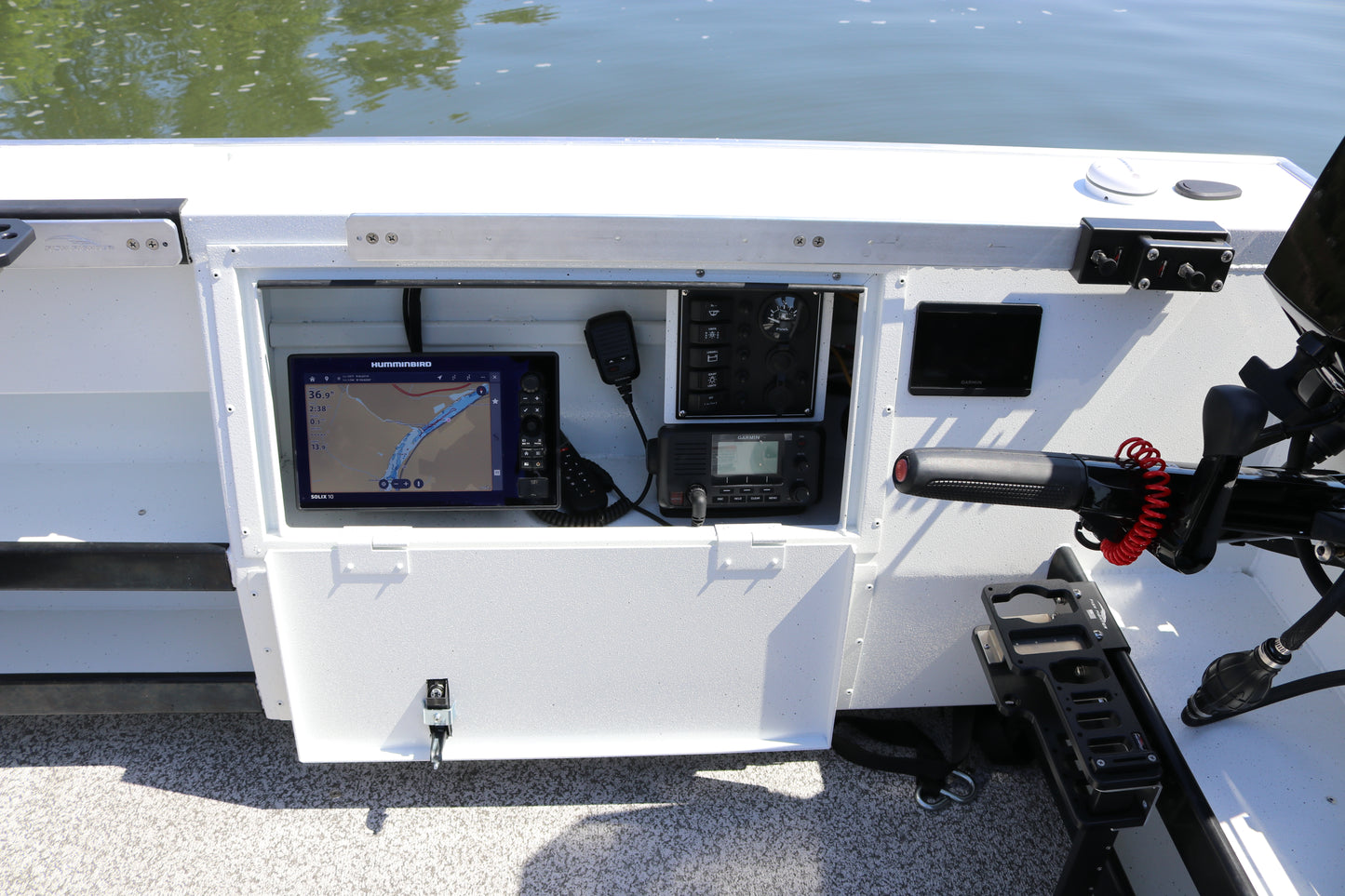 An Alumaweld Columbia 23' boat in motion on a body of water.