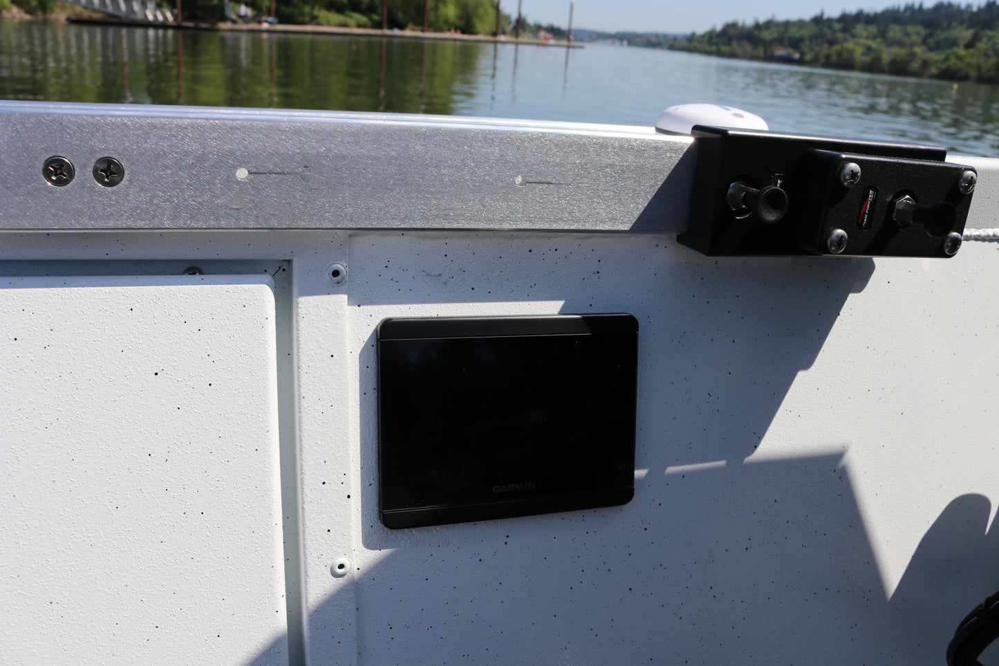 An Alumaweld Columbia 23' boat in motion on a body of water.