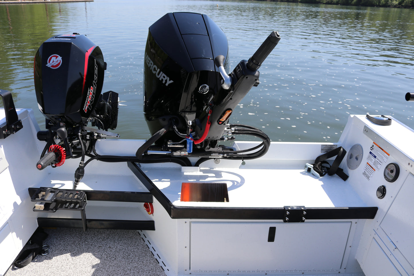 An Alumaweld Columbia 23' boat in motion on a body of water.