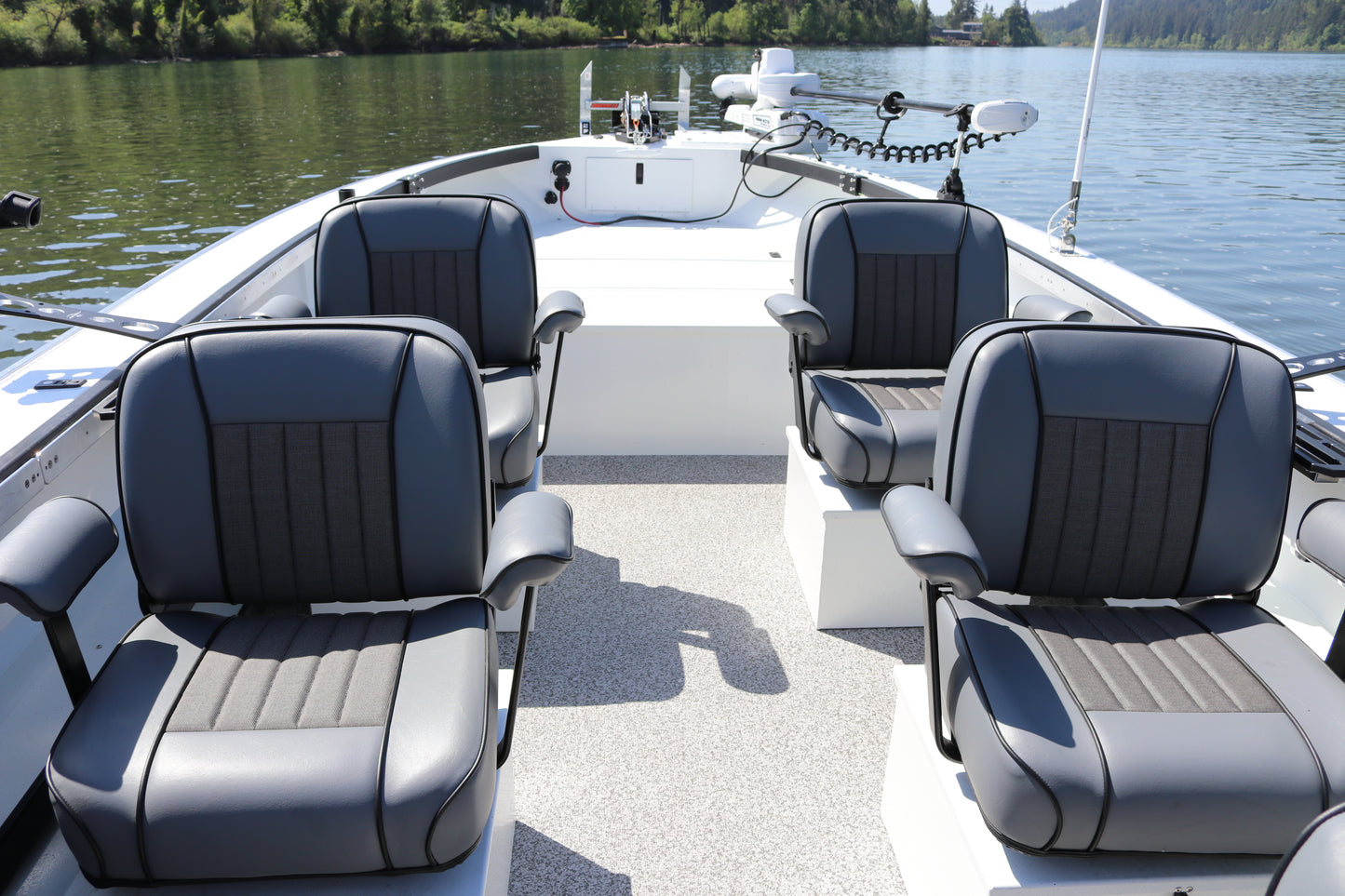 An Alumaweld Columbia 23' boat in motion on a body of water.