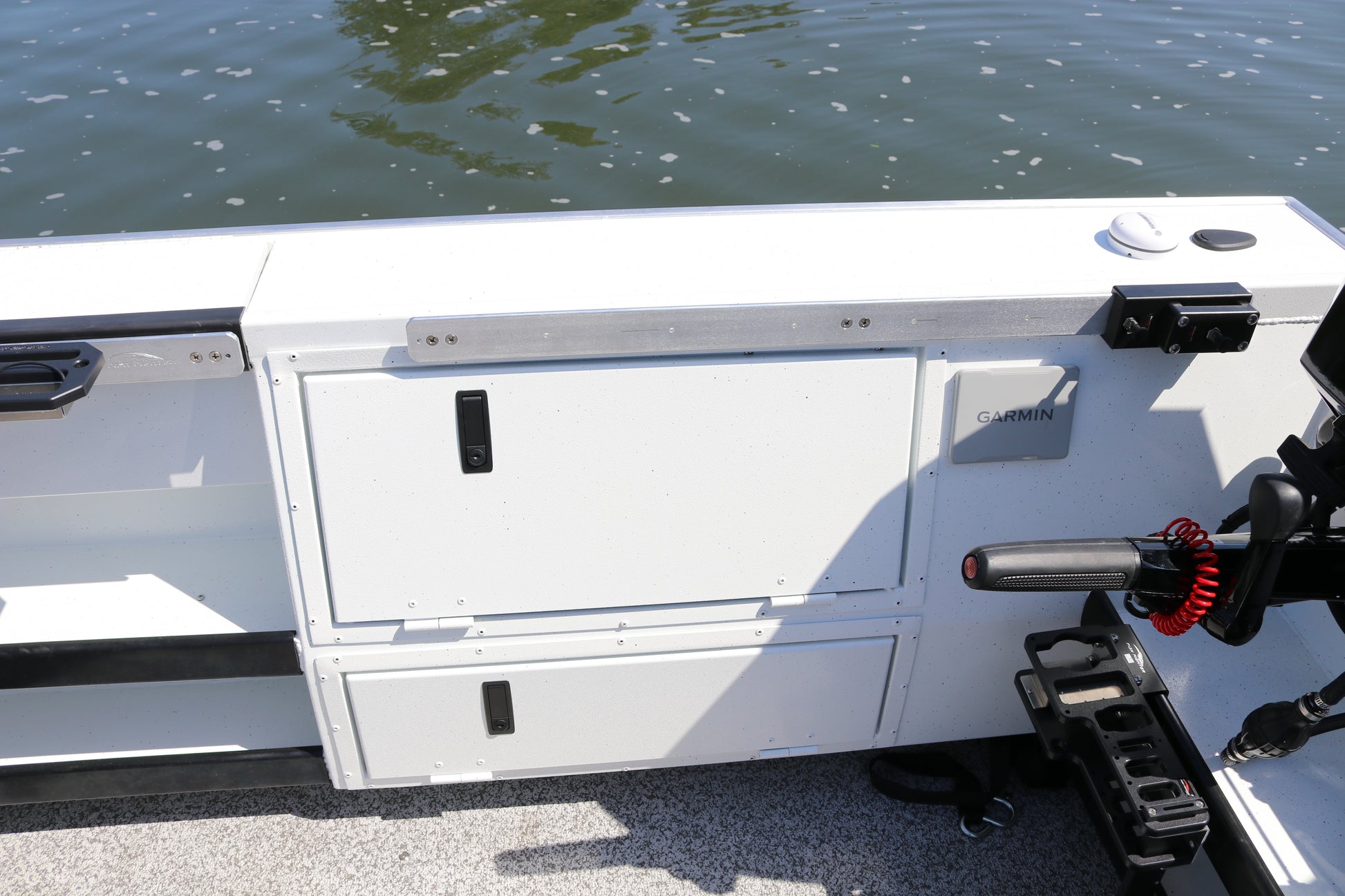 An Alumaweld Columbia 23' boat in motion on a body of water.