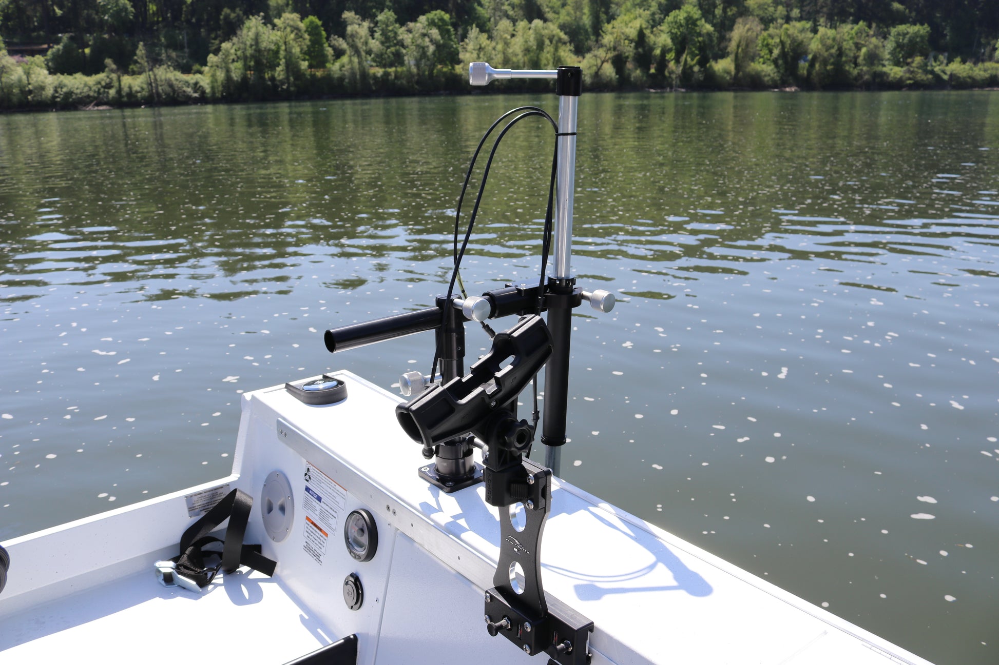 An Alumaweld Columbia 23' boat in motion on a body of water.